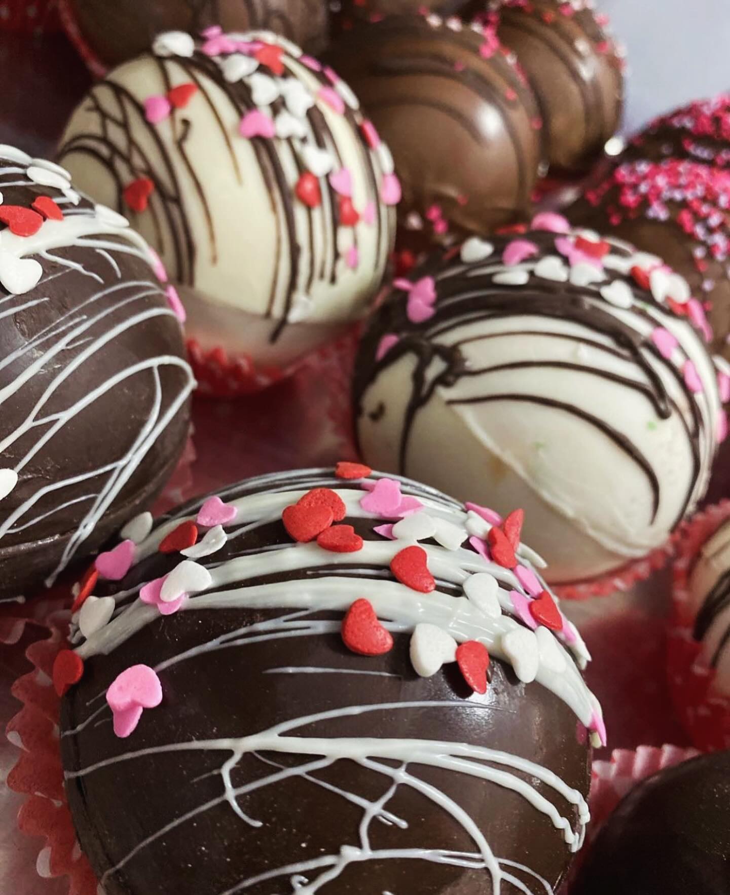 custom chocolate bombs by Chocolate by Michelle