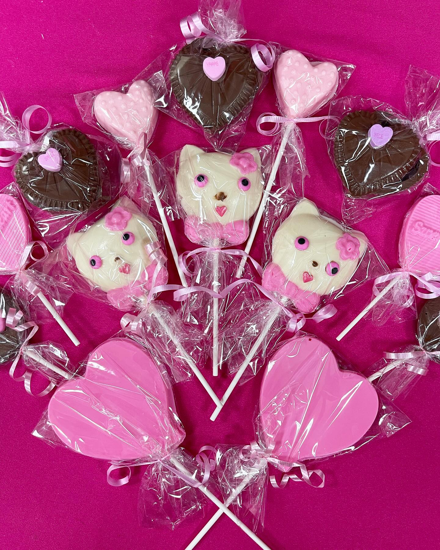 custom cat and heart-shaped chocolates by Chocolate by Michelle